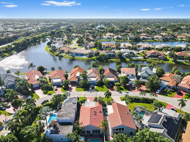 aerial view with a water view and a residential view