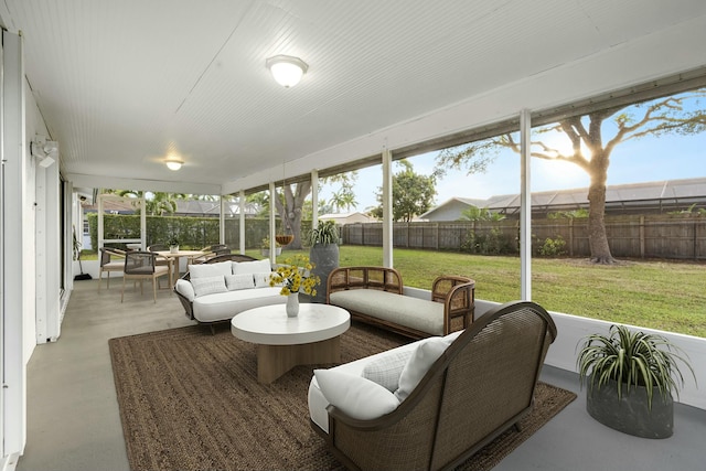 sunroom / solarium featuring a healthy amount of sunlight