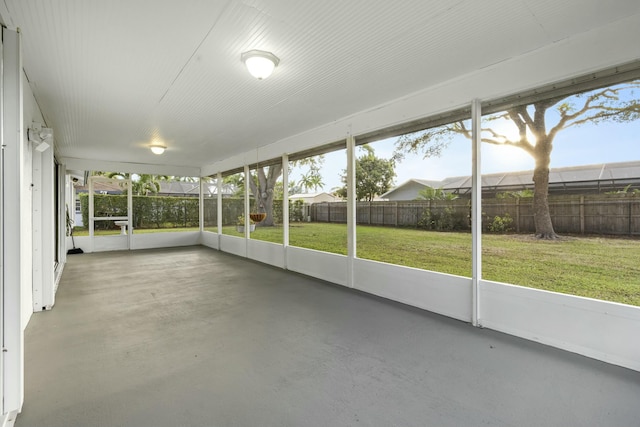 unfurnished sunroom featuring plenty of natural light