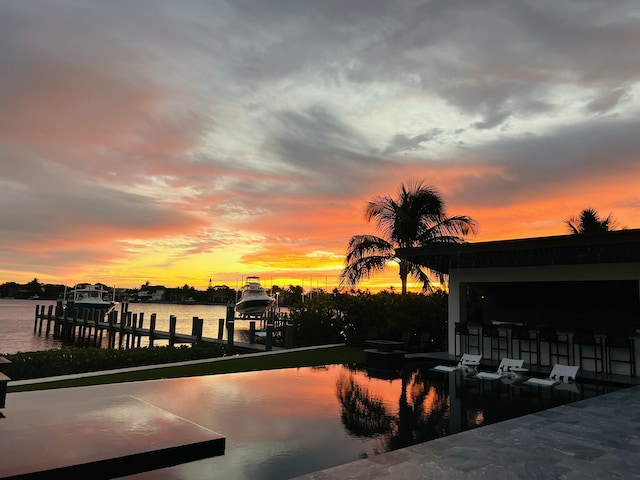 dock area featuring a water view