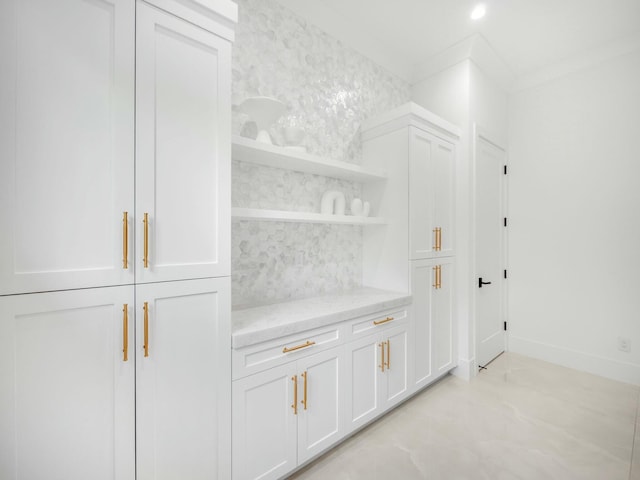 interior space featuring recessed lighting and baseboards