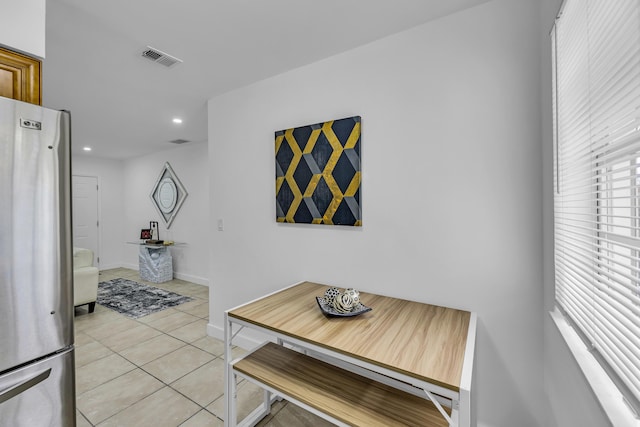 dining space with light tile patterned floors, baseboards, visible vents, and recessed lighting