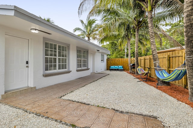 view of patio with a fenced backyard and outdoor lounge area