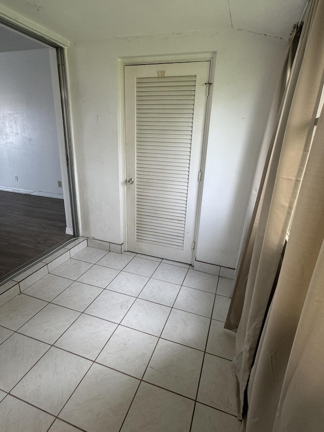 interior space featuring light tile patterned floors