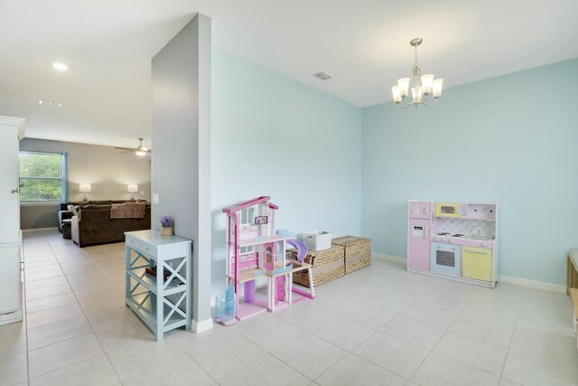 kitchen with a center island with sink, appliances with stainless steel finishes, light tile patterned flooring, a sink, and recessed lighting