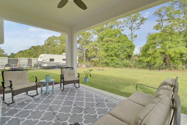 living area with a ceiling fan, visible vents, baseboards, and light tile patterned floors