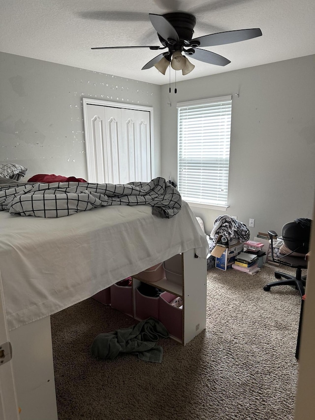 6101 NW Painted Bunting Ct, Port Saint Lucie, FL 34986 - carpeted bedroom featuring a closet and ceiling fan