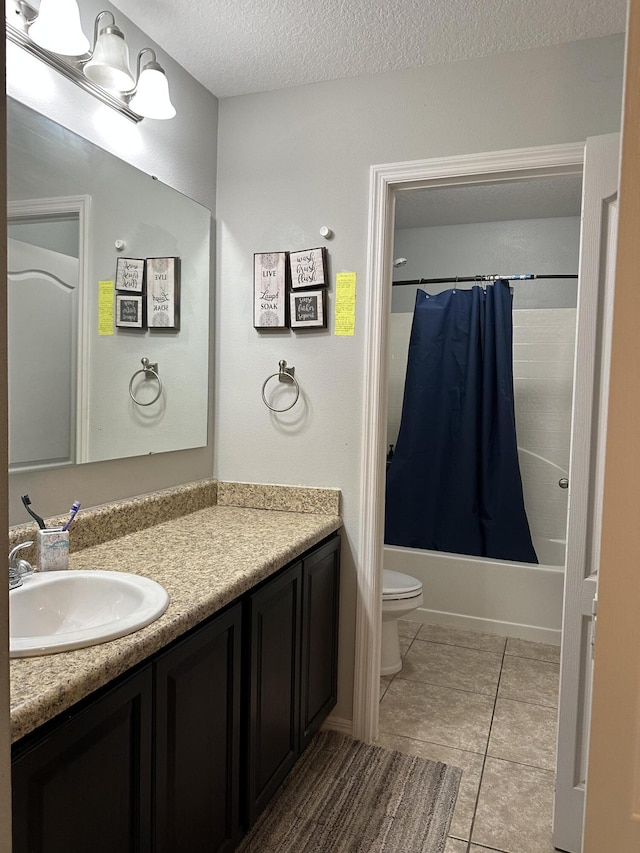 6101 NW Painted Bunting Ct, Port Saint Lucie, FL 34986 - bathroom with vanity, toilet, a textured ceiling, shower / bath combination with curtain, and tile patterned flooring