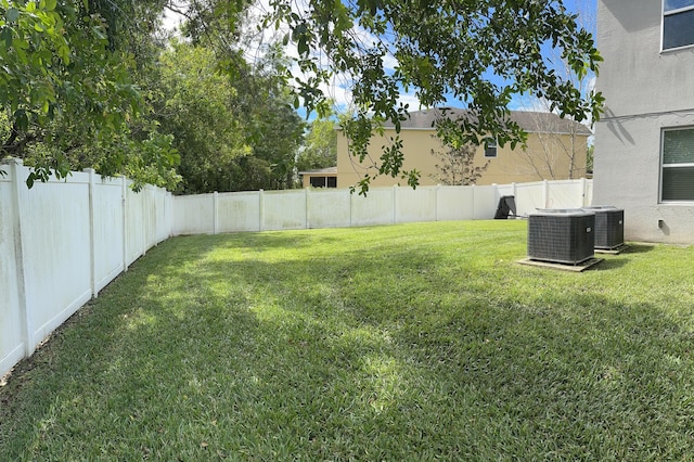 6101 NW Painted Bunting Ct, Port Saint Lucie, FL 34986 - view of yard featuring central AC unit