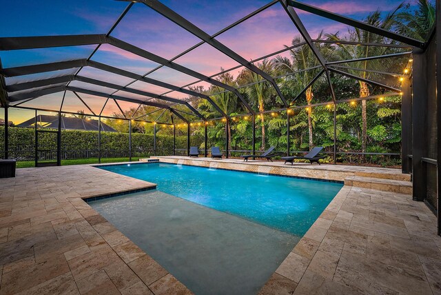 271 Rudder Cay Way, Jupiter, FL 33458 - mediterranean / spanish-style house featuring decorative driveway, stucco siding, a tiled roof, an attached garage, and a yard