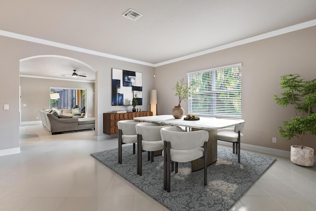 271 Rudder Cay Way, Jupiter, FL 33458 - kitchen featuring ornamental molding, a peninsula, a kitchen bar, and stainless steel appliances