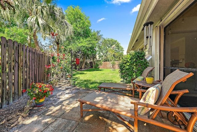 view of patio with a fenced backyard