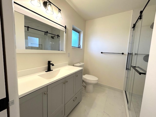 bathroom with toilet, vanity, baseboards, marble finish floor, and a shower stall