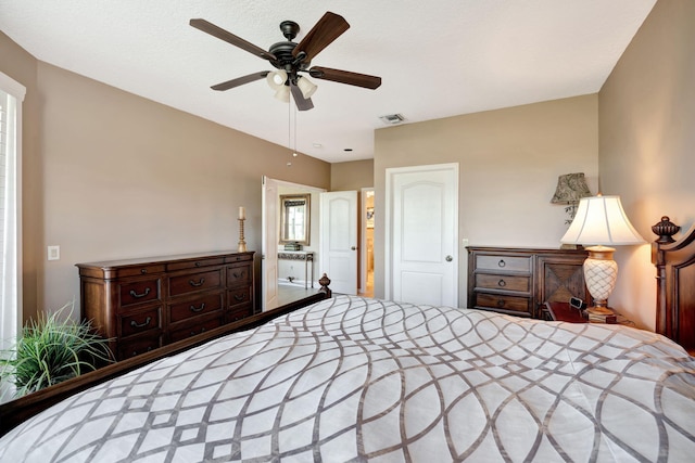 bedroom featuring visible vents and a ceiling fan