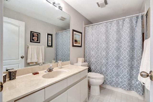 bathroom featuring tile patterned flooring, toilet, a shower with shower curtain, vanity, and visible vents