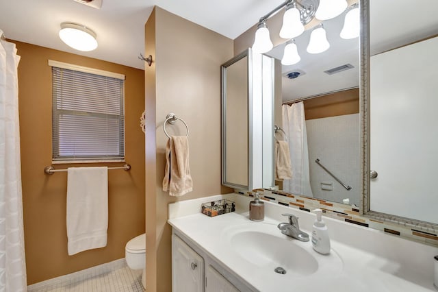 bathroom with toilet, tile patterned flooring, visible vents, and vanity