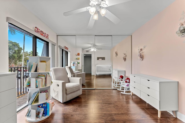 9965 NW 6th Ct, Plantation, FL 33324 - living area with ceiling fan and dark wood-style flooring