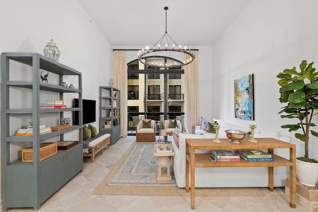 living area featuring an inviting chandelier and light tile patterned flooring