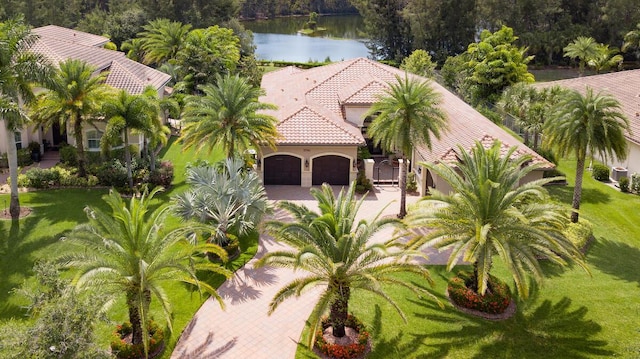 birds eye view of property featuring a water view