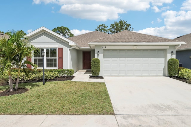 ranch-style house featuring concrete driveway, a front lawn, an attached garage, and stucco siding