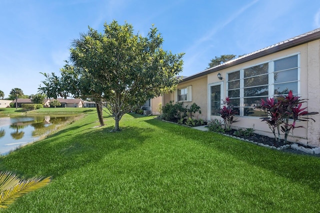 view of yard with a water view