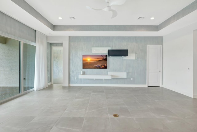 unfurnished living room featuring recessed lighting, visible vents, baseboards, and wallpapered walls