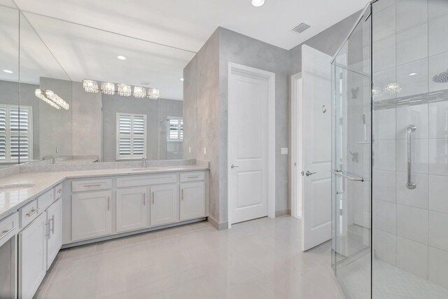 full bath with a stall shower, vanity, visible vents, and recessed lighting