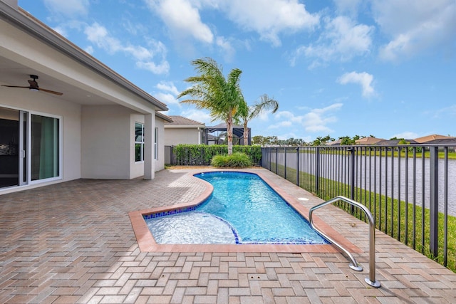 view of pool featuring ceiling fan, a patio area, a fenced backyard, and a fenced in pool