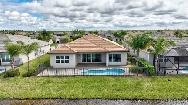 back of house with a patio, a fenced backyard, and a residential view