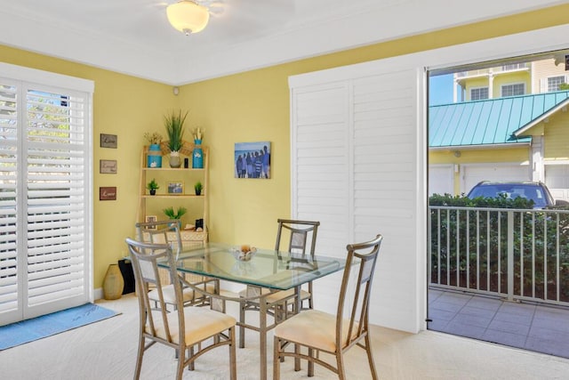 view of carpeted dining space