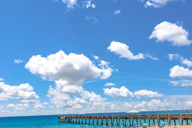 property view of water featuring a pier