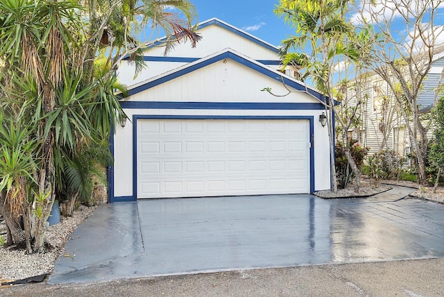 garage featuring driveway