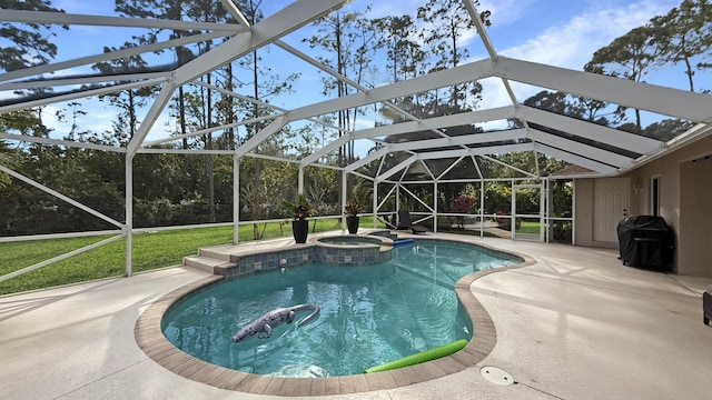 view of pool with a patio area, glass enclosure, area for grilling, and a pool with connected hot tub