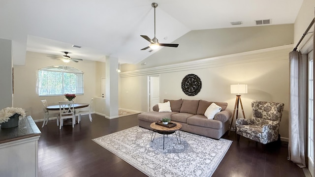 living room featuring lofted ceiling, ceiling fan, dark wood finished floors, and visible vents