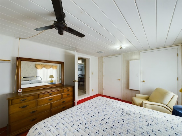 bedroom featuring ceiling fan and baseboards