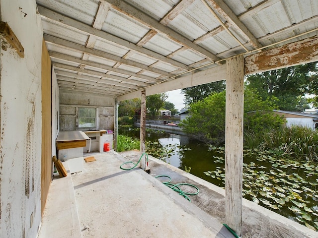 view of patio / terrace with a water view