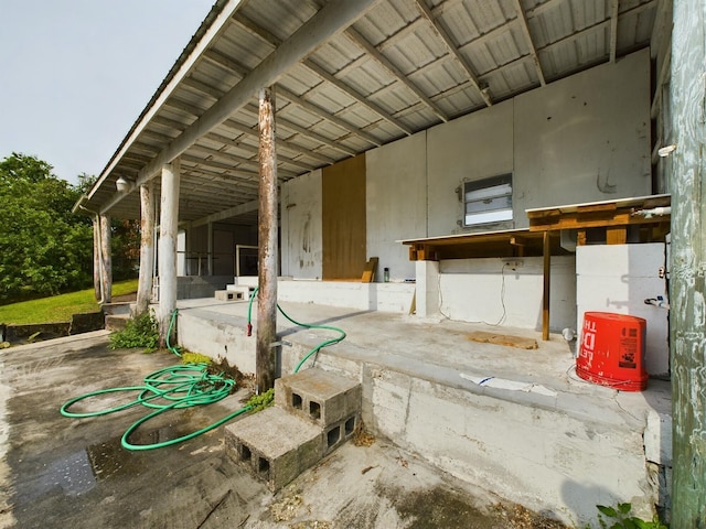 view of patio with an exterior structure