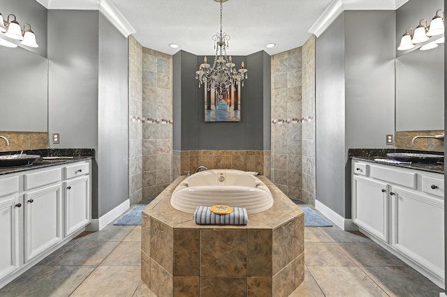 bathroom featuring two vanities, a sink, and tile patterned floors