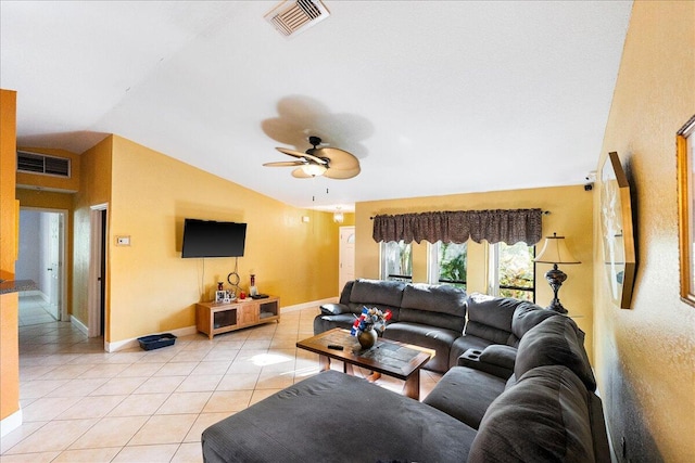 living room featuring light tile patterned floors, visible vents, vaulted ceiling, and a ceiling fan