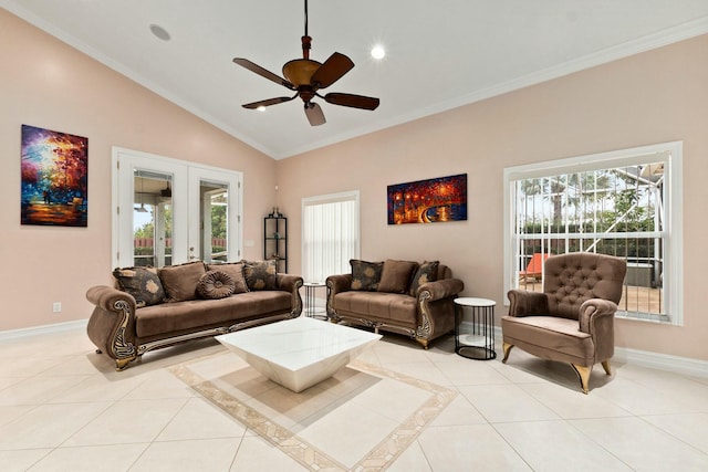 living area featuring french doors, baseboards, and light tile patterned floors