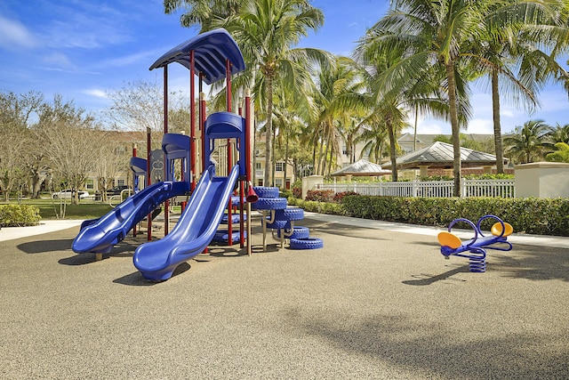 community playground featuring fence