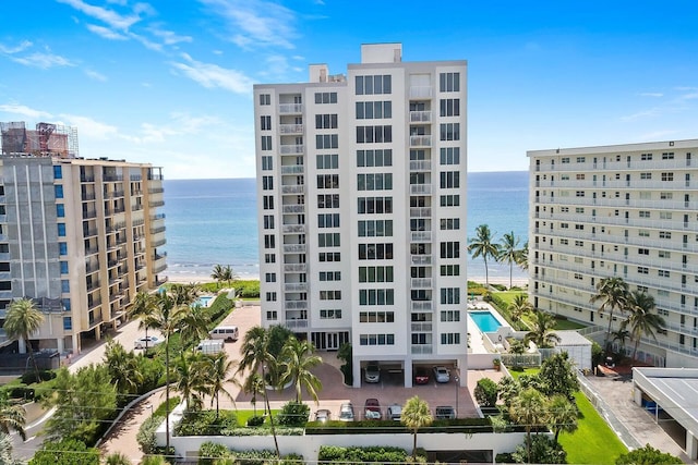 view of building exterior with a water view