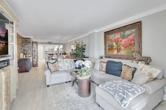 living area with crown molding