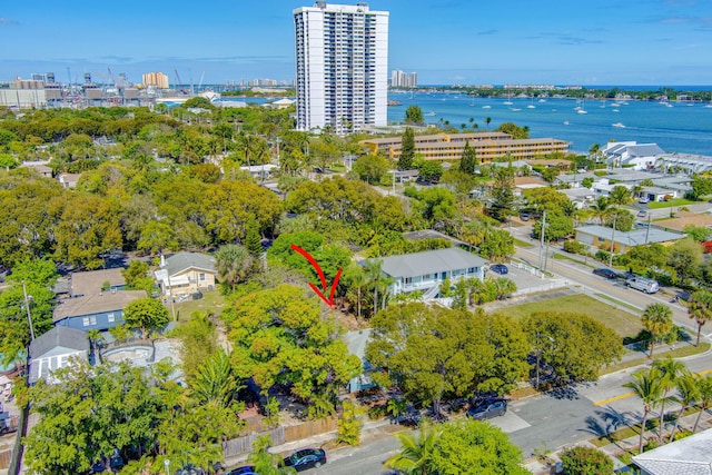 aerial view featuring a water view and a view of city