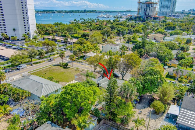 aerial view featuring a water view and a view of city