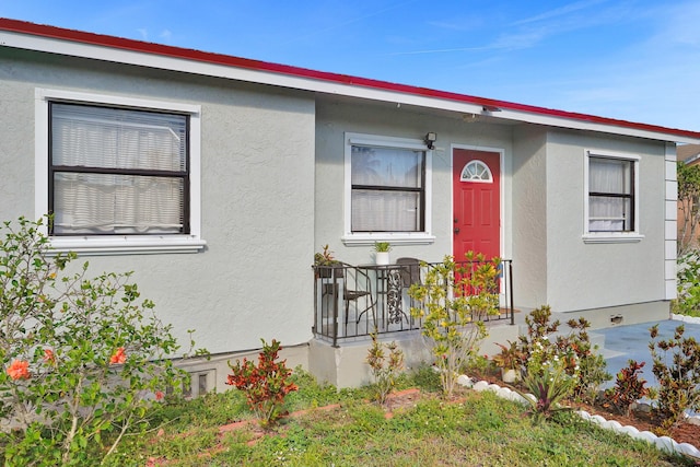 view of front of property featuring stucco siding