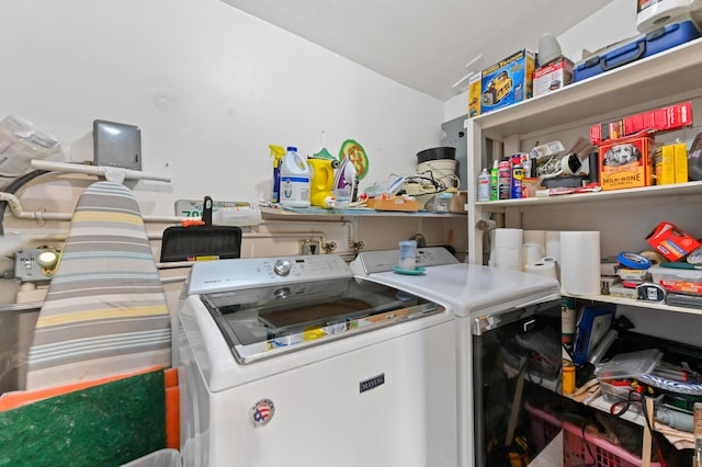 laundry area with laundry area and washing machine and clothes dryer