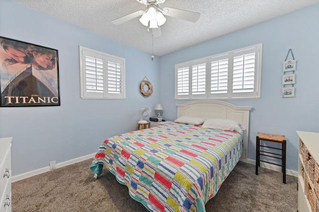 bedroom with carpet, baseboards, ceiling fan, and a textured ceiling