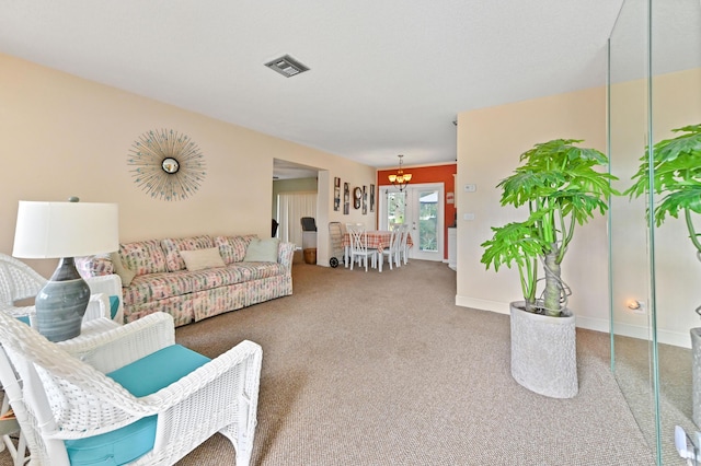 living room featuring carpet floors, baseboards, and visible vents