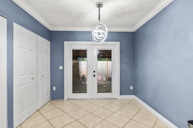 unfurnished dining area with baseboards, french doors, light tile patterned flooring, and crown molding